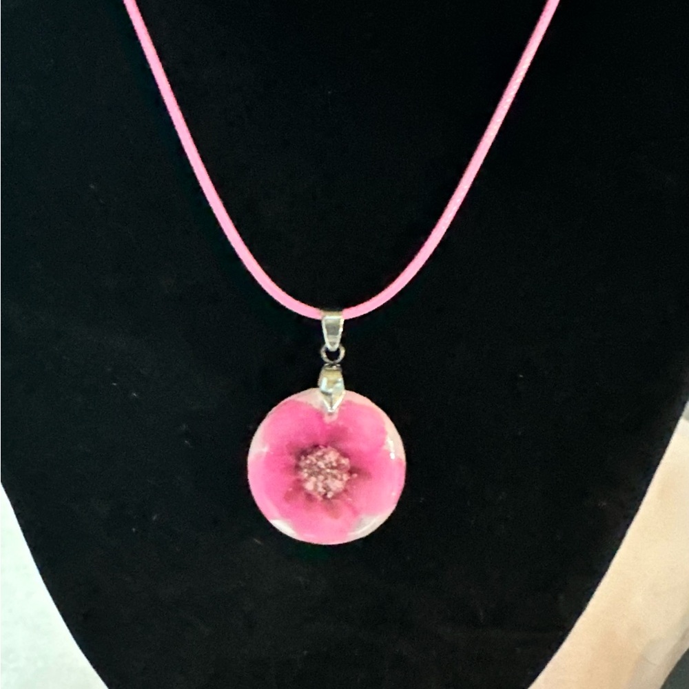 Resin pendant and necklace.